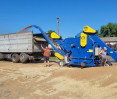 Очистка и отгрузка зерна на току в грузовик на зерноочистительной машине ОВС-70М4П, фото